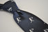 navy tie with tennis player embroidered design